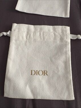 Dior Cream Drawstring Pouch with Gold Logo